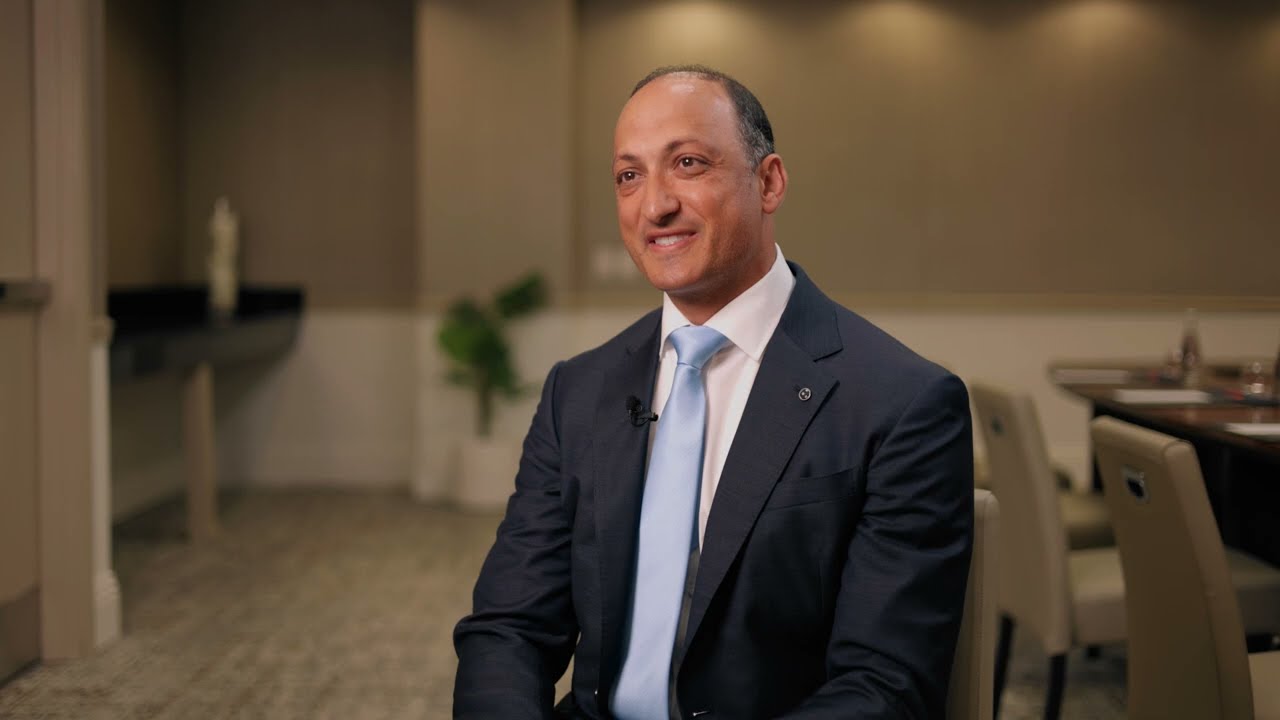 Dr. Ramis Gheith seated for an interview